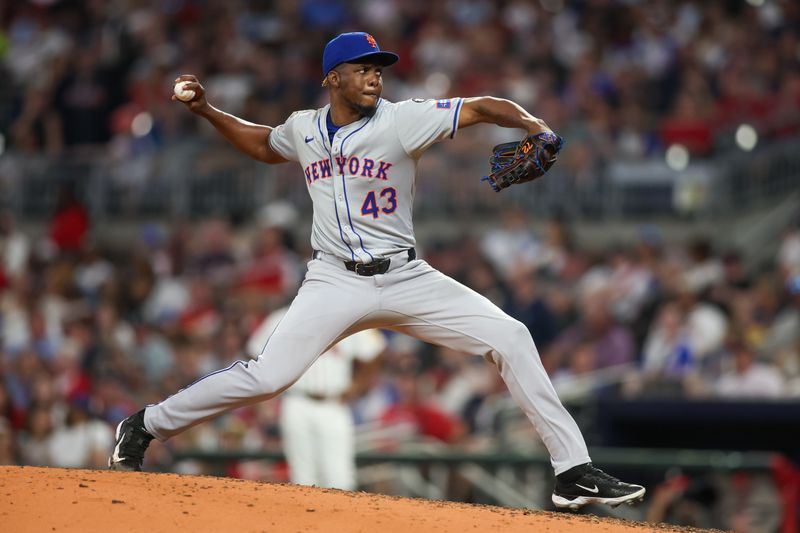 Sep 24, 2024; Atlanta, Georgia, USA; New York Mets relief pitcher Huascar Brazoban (43) throws against the Atlanta Braves in the sixth inning at Truist Park. Mandatory Credit: Brett Davis-Imagn Images