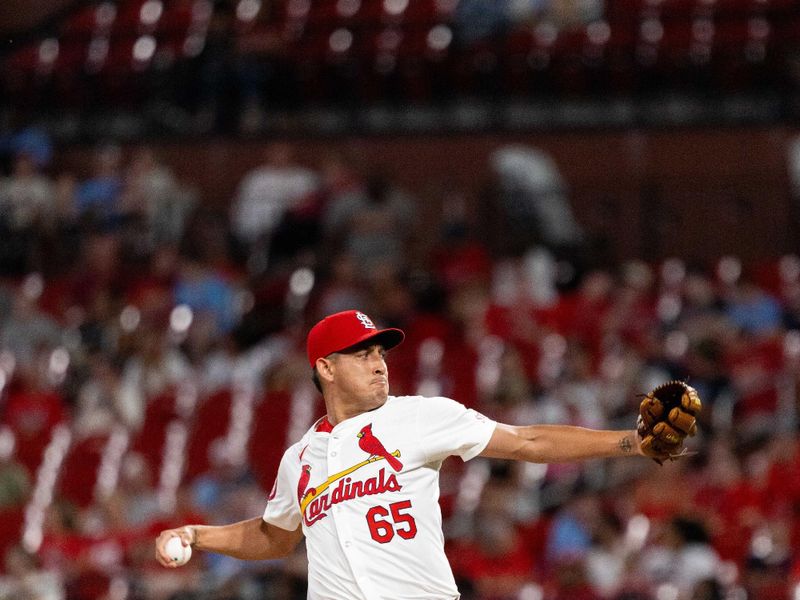 Jun 27, 2024; St. Louis, Missouri, USA; St. Louis Cardinals pitcher Giovanny Gallegos (65) pitches against the Cincinnati Reds in the seventh inning at Busch Stadium. Mandatory Credit: Zach Dalin-USA TODAY Sports