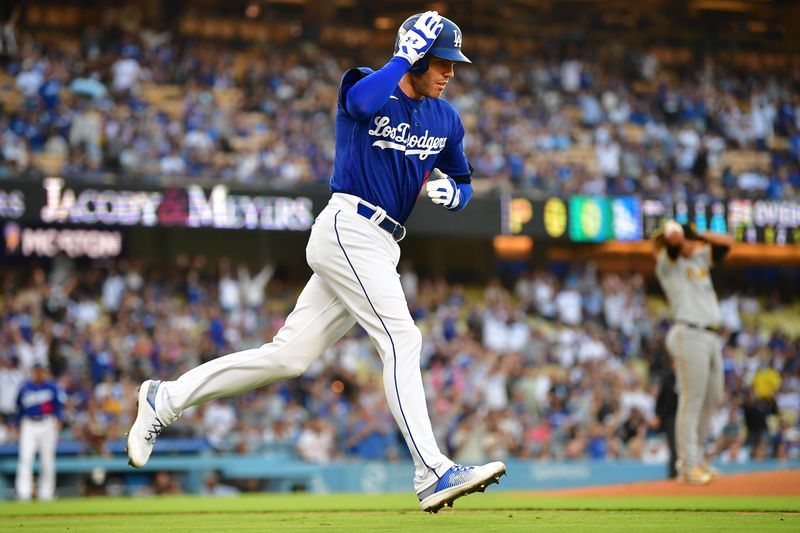 Jul 6, 2023; Los Angeles, California, USA; Los Angeles Dodgers first baseman Freddie Freeman (5) rounds the bases after hitting a two run home run against the Pittsburgh Pirates during the first inning at Dodger Stadium. Mandatory Credit: Gary A. Vasquez-USA TODAY Sports