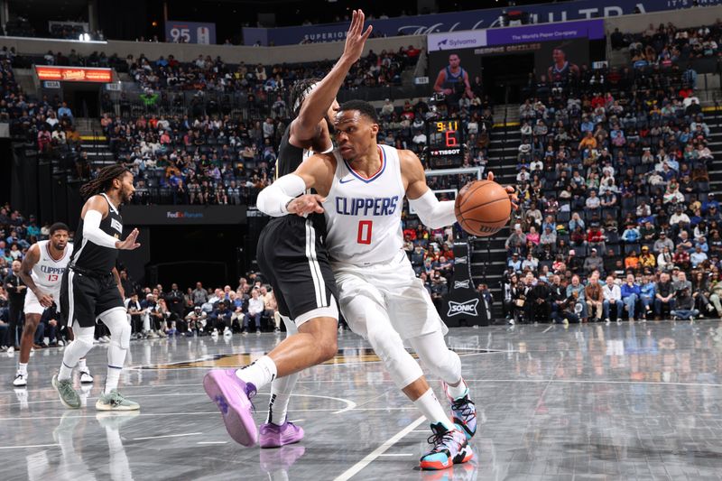 MEMPHIS, TN - FEBRUARY 23: Russell Westbrook #0 of the LA Clippers dribbles the ball during the game against the Memphis Grizzlies on February 23, 2024 at FedExForum in Memphis, Tennessee. NOTE TO USER: User expressly acknowledges and agrees that, by downloading and or using this photograph, User is consenting to the terms and conditions of the Getty Images License Agreement. Mandatory Copyright Notice: Copyright 2024 NBAE (Photo by Joe Murphy/NBAE via Getty Images)