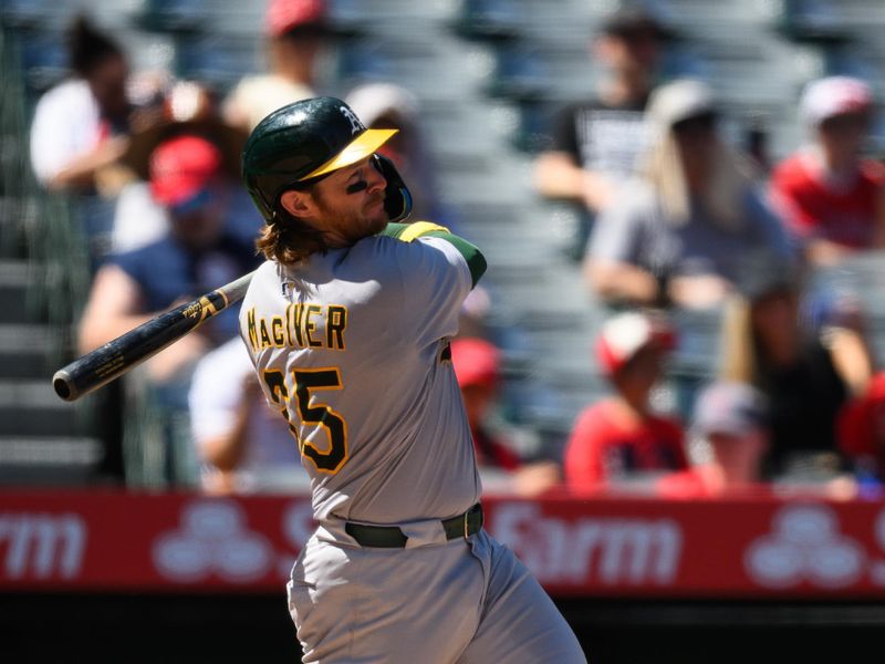 Sep 7, 2025; Anaheim, California, USA; Athletics catcher Willie MacIver (65) watches his home run against the Los Angeles Angels during the third inning at Angel Stadium. Mandatory Credit: William Liang-Imagn Images