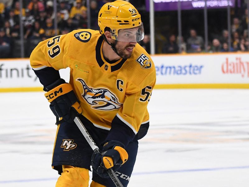 Mar 2, 2024; Nashville, Tennessee, USA; Nashville Predators defenseman Roman Josi (59) skates with the puck during the first period against the Colorado Avalanche at Bridgestone Arena. Mandatory Credit: Christopher Hanewinckel-USA TODAY Sports