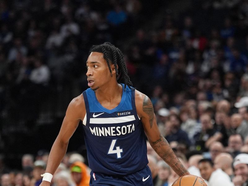 MINNEAPOLIS, MN -  DECEMBER 13: Rob Dillingham #4 of the Minnesota Timberwolves dribbles the ball during the game against the Los Angeles Lakers on December 13, 2024 at Target Center in Minneapolis, Minnesota. NOTE TO USER: User expressly acknowledges and agrees that, by downloading and or using this Photograph, user is consenting to the terms and conditions of the Getty Images License Agreement. Mandatory Copyright Notice: Copyright 2024 NBAE (Photo by Jordan Johnson/NBAE via Getty Images)