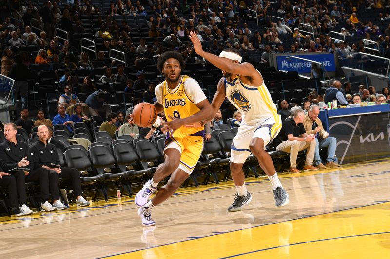 SAN FRANCISCO, CA - OCTOBER 18: Bronny James #9 of the Los Angeles Lakers drives to the basket during the game against the Golden State Warriors during a NBA Preseason game on October 18, 2024 at Chase Center in San Francisco, California. NOTE TO USER: User expressly acknowledges and agrees that, by downloading and or using this photograph, user is consenting to the terms and conditions of Getty Images License Agreement. Mandatory Copyright Notice: Copyright 2024 NBAE (Photo by Noah Graham/NBAE via Getty Images)