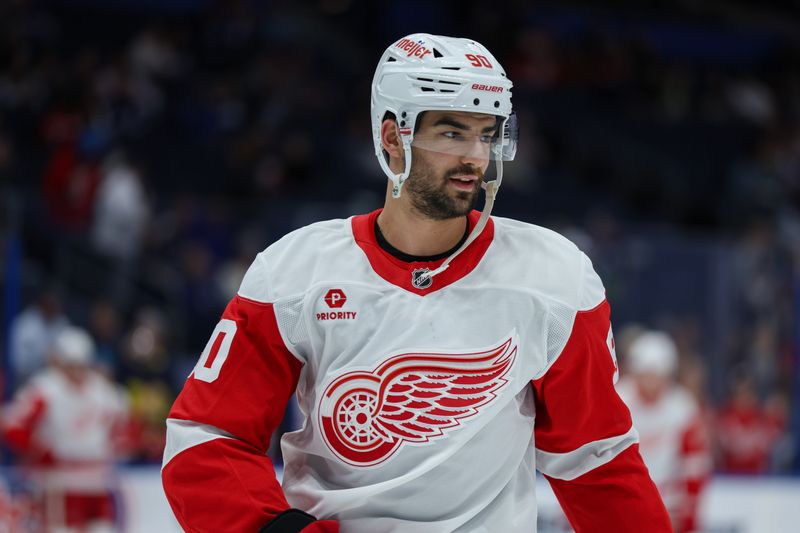 Jan 18, 2025; Tampa, Florida, USA; Detroit Red Wings center Joe Veleno (90) warms up before a game against the Tampa Bay Lightning at Amalie Arena. Mandatory Credit: Nathan Ray Seebeck-Imagn Images