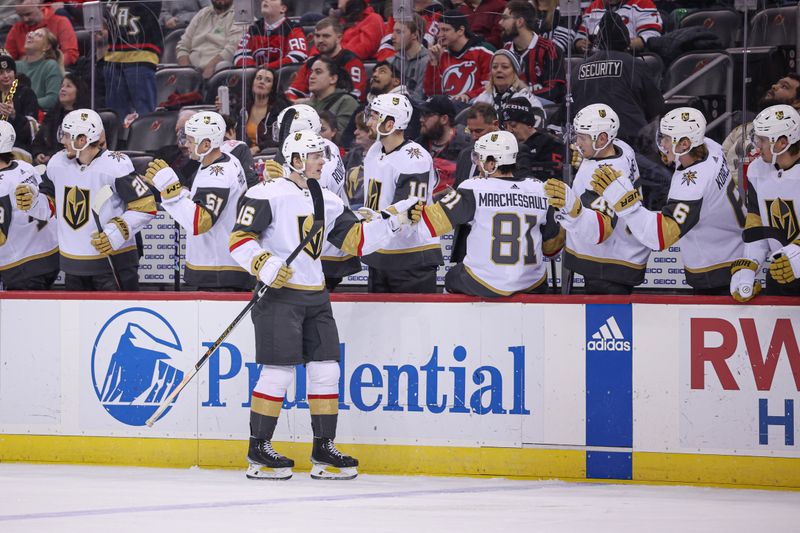 Jan 22, 2024; Newark, New Jersey, USA; Vegas Golden Knights left wing Pavel Dorofeyev (16) celebrates with teammates after his goal during the first period against the New Jersey Devils at Prudential Center. Mandatory Credit: Vincent Carchietta-USA TODAY Sports