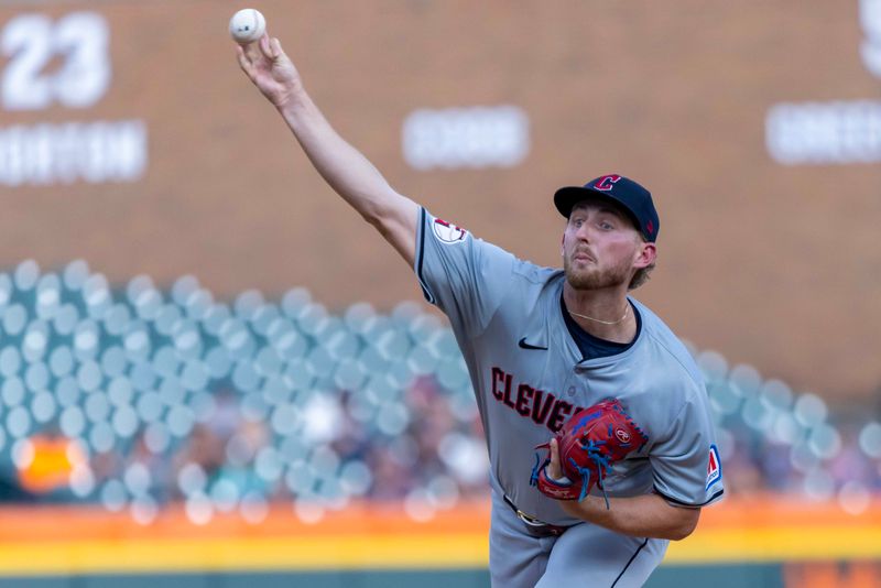 Jul 29, 2024; Detroit, Michigan, USA; Cleveland Guardians starting pitcher Tanner Bibee (28) delivers in the first inning against the Detroit Tigers at Comerica Park. Mandatory Credit: David Reginek-USA TODAY Sports