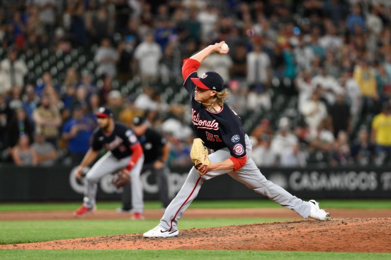 Jun 27, 2023; Seattle, Washington, USA; Washington Nationals relief pitcher Jordan Weems (51) pitches to the Seattle Mariners during the tenth inning at T-Mobile Park. Mandatory Credit: Steven Bisig-USA TODAY Sports