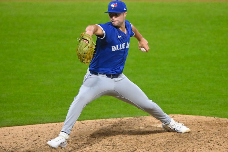 Jun 25, 2025; Cleveland, Ohio, USA; Toronto Blue Jays relief pitcher Mason Fluharty (68) deliver a pitch in the tenth inning against the Cleveland Guardians at Progressive Field. Mandatory Credit: David Richard-Imagn Images