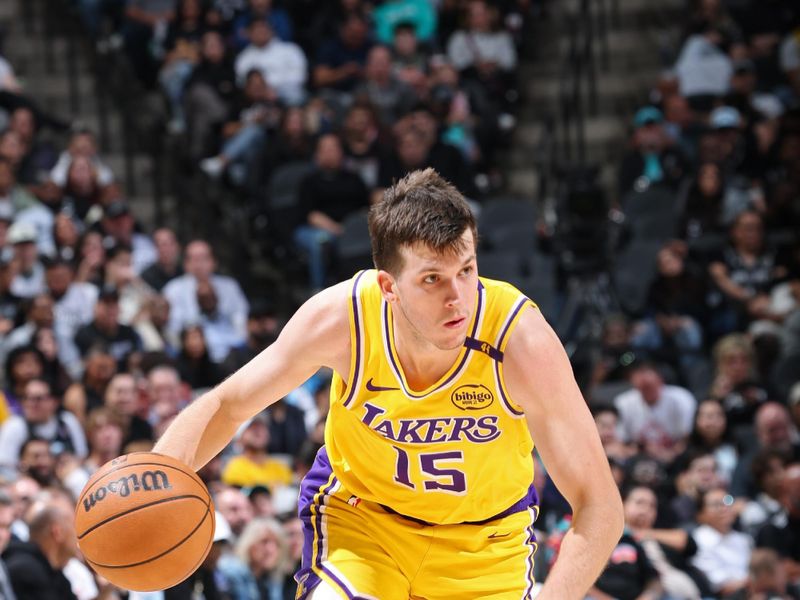 SAN ANTONIO, TX - NOVEMBER 27: Austin Reaves #15 of the Los Angeles Lakers handles the ball during the game against the San Antonio Spurs on November 27, 2024 at the Frost Bank Center in San Antonio, Texas. NOTE TO USER: User expressly acknowledges and agrees that, by downloading and or using this photograph, user is consenting to the terms and conditions of the Getty Images License Agreement. Mandatory Copyright Notice: Copyright 2024 NBAE (Photos by Jeff Haynes/NBAE via Getty Images)