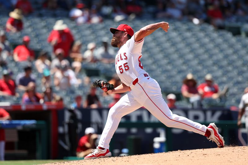 Jun 26, 2024; Anaheim, California, USA;  Los Angeles Angels relief pitcher Matt Moore (55) pitches during the sixth inning against the Oakland Athletics at Angel Stadium. Mandatory Credit: Kiyoshi Mio-USA TODAY Sports