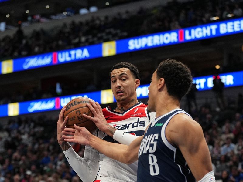 DALLAS, TX - FEBRUARY 12: Kyle Kuzma #33 of the Washington Wizards handles the ball during the game against the Dallas Mavericks on February 12, 2024 at the American Airlines Center in Dallas, Texas. NOTE TO USER: User expressly acknowledges and agrees that, by downloading and or using this photograph, User is consenting to the terms and conditions of the Getty Images License Agreement. Mandatory Copyright Notice: Copyright 2024 NBAE (Photo by Glenn James/NBAE via Getty Images)