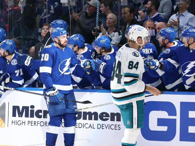 Oct 26, 2023; Tampa, Florida, USA; Tampa Bay Lightning left wing Nicholas Paul (20) is congratulated after he score a goal against the San Jose Sharks during the second period at Amalie Arena. Mandatory Credit: Kim Klement Neitzel-USA TODAY Sports