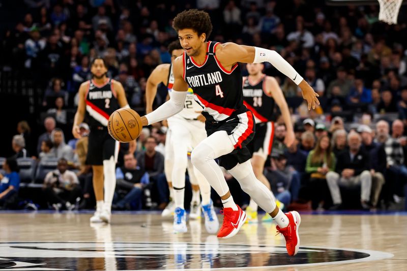 MINNEAPOLIS, MN - APRIL 02: Matisse Thybulle #4 of the Portland Trail Blazers dribbles the ball against the Minnesota Timberwolves in the first quarter of the game at Target Center on April 2, 2023 in Minneapolis, Minnesota. NOTE TO USER: User expressly acknowledges and agrees that, by downloading and or using this Photograph, user is consenting to the terms and conditions of the Getty Images License Agreement. (Photo by David Berding/Getty Images)