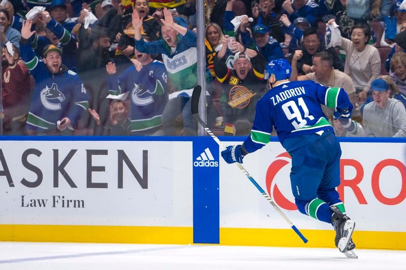 May 8, 2024; Vancouver, British Columbia, CAN; Vancouver Canucks defenseman Nikita Zadorov (91) celebrates his goal against the Edmonton Oilers during the third period in game one of the second round of the 2024 Stanley Cup Playoffs at Rogers Arena. Mandatory Credit: Bob Frid-USA TODAY Sports