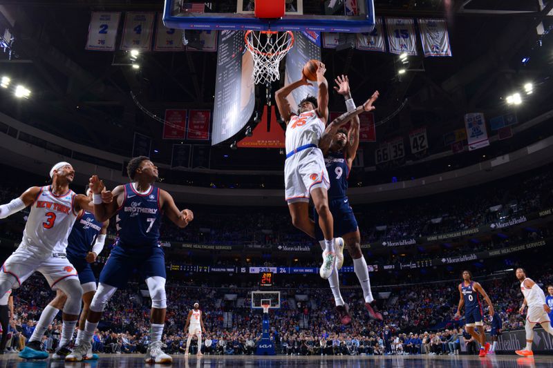 PHILADELPHIA, PA - FEBRUARY 22: Jericho Sims #45 of the New York Knicks dunks the ball during the game against the Philadelphia 76ers on February 22, 2024 at the Wells Fargo Center in Philadelphia, Pennsylvania NOTE TO USER: User expressly acknowledges and agrees that, by downloading and/or using this Photograph, user is consenting to the terms and conditions of the Getty Images License Agreement. Mandatory Copyright Notice: Copyright 2024 NBAE (Photo by Jesse D. Garrabrant/NBAE via Getty Images)