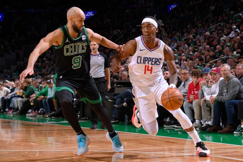 BOSTON, MA - JANUARY 27: Terance Mann #14 of the LA Clippers dribbles the ball during the game against the Boston Celtics on January 27, 2024 at the TD Garden in Boston, Massachusetts. NOTE TO USER: User expressly acknowledges and agrees that, by downloading and or using this photograph, User is consenting to the terms and conditions of the Getty Images License Agreement. Mandatory Copyright Notice: Copyright 2024 NBAE  (Photo by Brian Babineau/NBAE via Getty Images)