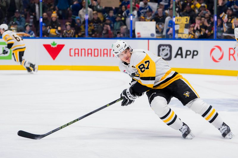 Feb 27, 2024; Vancouver, British Columbia, CAN; Pittsburgh Penguins forward Sidney Crosby (87) skates during warm up prior to a game against the Vancouver Canucks at Rogers Arena. Mandatory Credit: Bob Frid-USA TODAY Sports