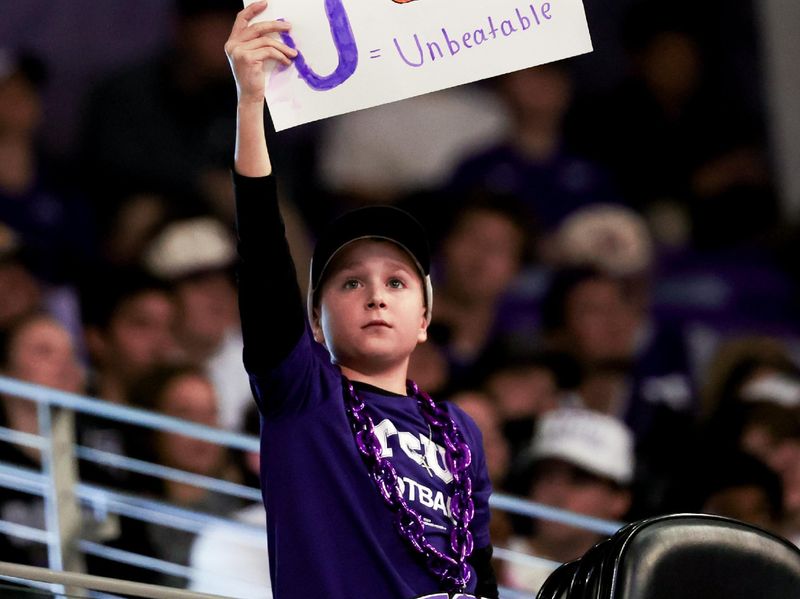 Jan 13, 2024; Fort Worth, Texas, USA;  TCU Horned Frogs fan holds up a sign during the second half against the Houston Cougars at Ed and Rae Schollmaier Arena. Mandatory Credit: Kevin Jairaj-USA TODAY Sports