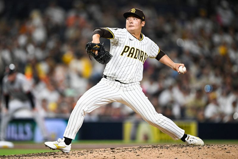 Aug 20, 2025; San Diego, California, USA; San Diego Padres relief pitcher Yuki Matsui (1) delivers during the eighth inning against the San Francisco Giants at Petco Park. Mandatory Credit: Denis Poroy-Imagn Images
