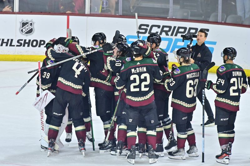 Nov 7, 2023; Tempe, Arizona, USA; The Arizona Coyotes celebrate after beating the Seattle Kraken in an overtime shootout at Mullett Arena. Mandatory Credit: Matt Kartozian-USA TODAY Sports