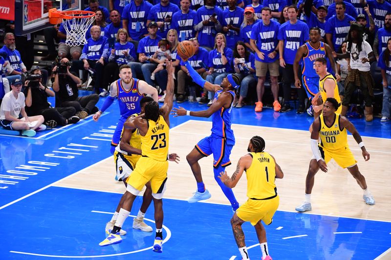 OKLAHOMA CITY, OK - JUNE 8: Shai Gilgeous-Alexander #2 of the Oklahoma City Thunder drives to the basket during the game against the Indiana Pacers during Game Two of the 2025 NBA Finals on June 8, 2025 at Paycom Center in Oklahoma City, Oklahoma. NOTE TO USER: User expressly acknowledges and agrees that, by downloading and or using this photograph, User is consenting to the terms and conditions of the Getty Images License Agreement. Mandatory Copyright Notice: Copyright 2025 NBAE (Photo by Adam Pantozzi/NBAE via Getty Images)