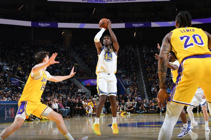 SAN FRANCISCO, CA - OCTOBER 18: Kevon Looney #5 of the Golden State Warriors shoots the ball during the game against the Los Angeles Lakers during a NBA Preseason game on October 18, 2024 at Chase Center in San Francisco, California. NOTE TO USER: User expressly acknowledges and agrees that, by downloading and or using this photograph, user is consenting to the terms and conditions of Getty Images License Agreement. Mandatory Copyright Notice: Copyright 2024 NBAE (Photo by Noah Graham/NBAE via Getty Images)