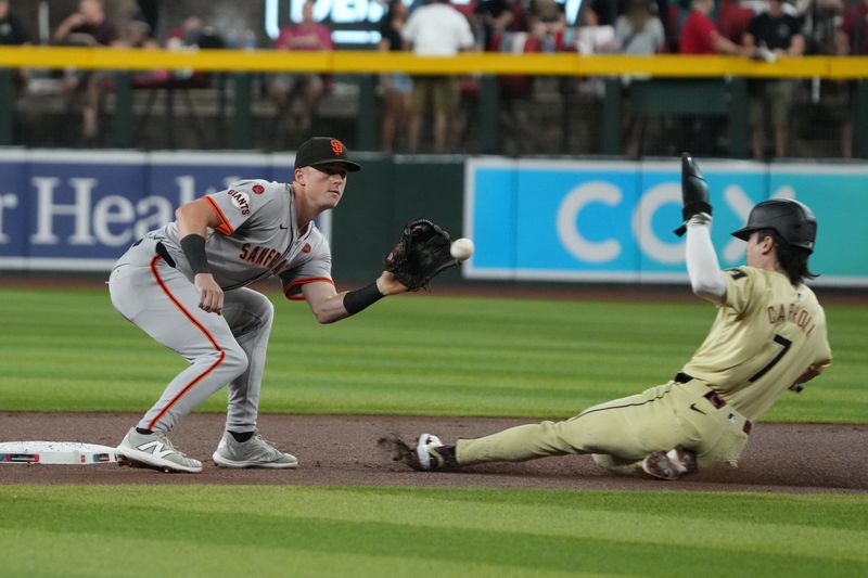 Sep 24, 2024; Phoenix, Arizona, USA; Arizona Diamondbacks outfielder Corbin Carroll (7) slides into second base in front of San Francisco Giants shortstop Brett Wisely (0) in the first inning at Chase Field. Mandatory Credit: Rick Scuteri-Imagn Images