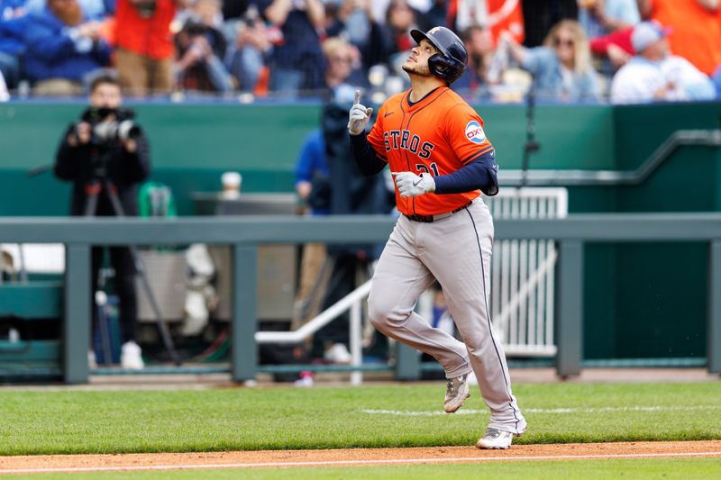 Apr 27, 2025; Kansas City, Missouri, USA; Houston Astros catcher Yainer Diaz (21) reacts after hitting a home run during the seventh inning against the Kansas City Royals at Kauffman Stadium. Mandatory Credit: William Purnell-Imagn Images