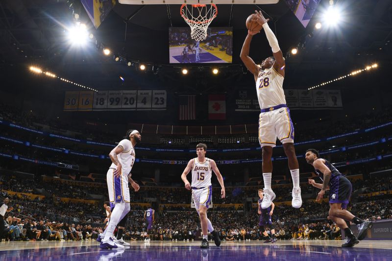 LOS ANGELES, CA - OCTOBER 26: Rui Hachimura #28 of the Los Angeles Lakers goes up for the rebound during the game against the Sacramento Kings on October 26, 2024 at Crypto.Com Arena in Los Angeles, California. NOTE TO USER: User expressly acknowledges and agrees that, by downloading and/or using this Photograph, user is consenting to the terms and conditions of the Getty Images License Agreement. Mandatory Copyright Notice: Copyright 2024 NBAE (Photo by Adam Pantozzi/NBAE via Getty Images)