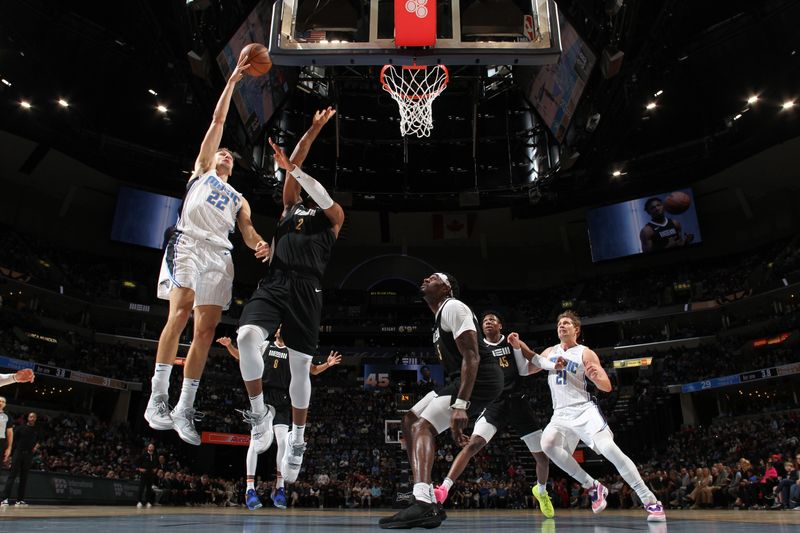 MEMPHIS, TN - JANUARY 26:  Franz Wagner #22 of the Orlando Magic drives to the basket during the game against the Memphis Grizzlies on January 26, 2024 at FedExForum in Memphis, Tennessee. NOTE TO USER: User expressly acknowledges and agrees that, by downloading and or using this photograph, User is consenting to the terms and conditions of the Getty Images License Agreement. Mandatory Copyright Notice: Copyright 2024 NBAE (Photo by Joe Murphy/NBAE via Getty Images)