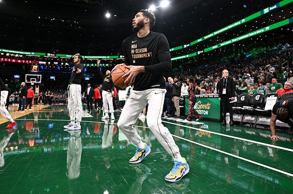 BOSTON, MASSACHUSETTS - NOVEMBER 28: Jayson Tatum #0 of the Boston Celtics dribbles the ball during warmups before an NBA In-Season Tournament game against the Chicago Bulls at the TD Garden on November 28, 2023 in Boston, Massachusetts. NOTE TO USER: User expressly acknowledges and agrees that, by downloading and or using this photograph, User is consenting to the terms and conditions of the Getty Images License Agreement. (Photo by Brian Fluharty/Getty Images)