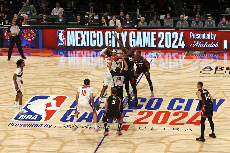 MEXICO CITY, MX - NOVEMBER 2: Opening tip-off during the game between the Miami Heat and the Washington Wizards as part of 2024 NBA Mexico Games on November 2, 2024 in Mexico City, Mexico at Arena Ciudad de Mexico. NOTE TO USER: User expressly acknowledges and agrees that, by downloading and or using this photograph, User is consenting to the terms and conditions of the Getty Images License Agreement. Mandatory Copyright Notice: Copyright 2024 NBAE (Photo by Kenny Giarla/NBAE via Getty Images)