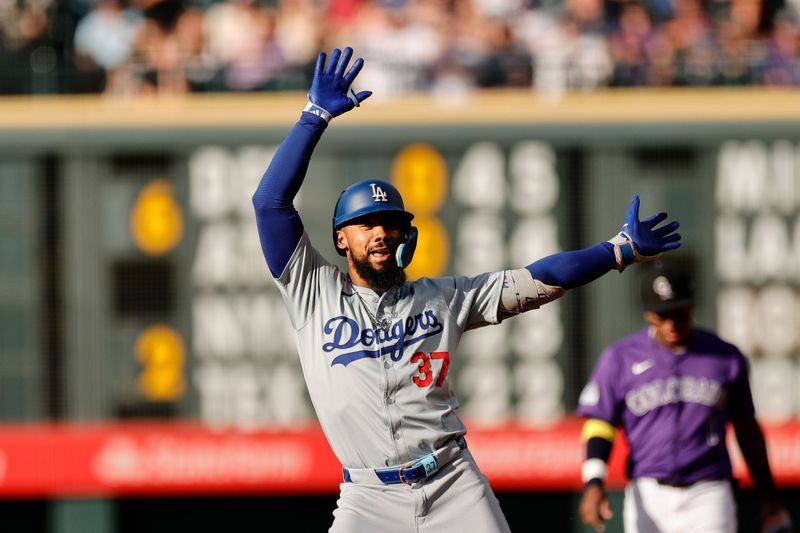 Jun 17, 2024; Denver, Colorado, USA; Los Angeles Dodgers left fielder Teoscar Hernandez (37) reacts from second on an RBI double in the first inning against the Colorado Rockies at Coors Field. Mandatory Credit: Isaiah J. Downing-USA TODAY Sports