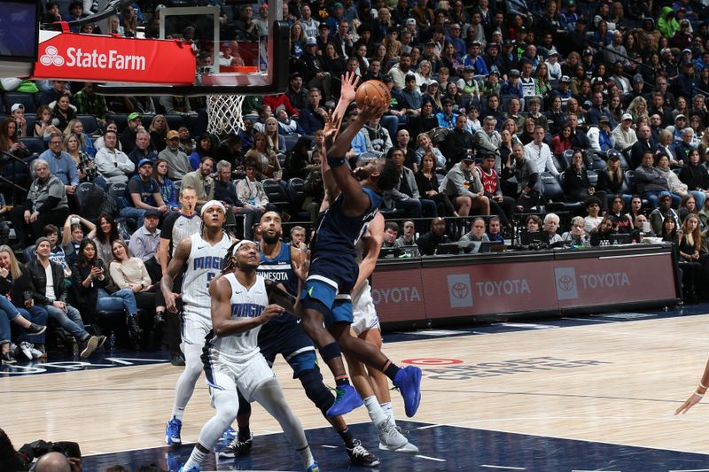 MINNEAPOLIS, MN -  FEBRUARY 2: Anthony Edwards #5 of the Minnesota Timberwolves shoots the ball during the game against the Orlando Magic on February 2, 2024 at Target Center in Minneapolis, Minnesota. NOTE TO USER: User expressly acknowledges and agrees that, by downloading and or using this Photograph, user is consenting to the terms and conditions of the Getty Images License Agreement. Mandatory Copyright Notice: Copyright 2024 NBAE (Photo by David Sherman/NBAE via Getty Images)