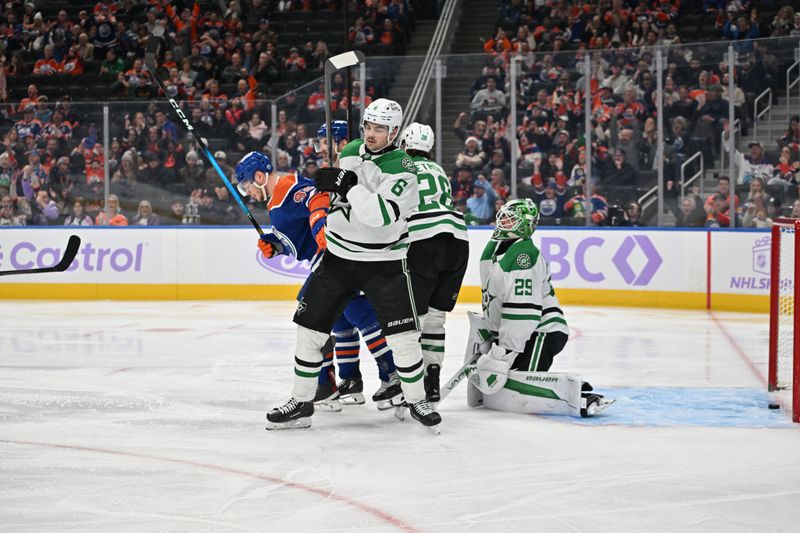 Nov 25, 2025; Edmonton, Alberta, CAN;  Edmonton Oilers right winger Vasily Podkolzin (92) gets in front of Dallas Stars defenceman Lian Bichsel (6) and goalie (29) Jake Oettinger during the third period at Rogers Place. Mandatory Credit: Walter Tychnowicz-Imagn Images