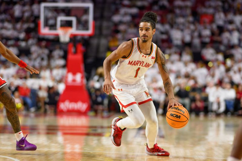 Dec 4, 2024; College Park, Maryland, USA; Maryland Terrapins guard Rodney Rice (1) handles the ball during the second half against the Ohio State Buckeyes at Xfinity Center. Mandatory Credit: Reggie Hildred-Imagn Images