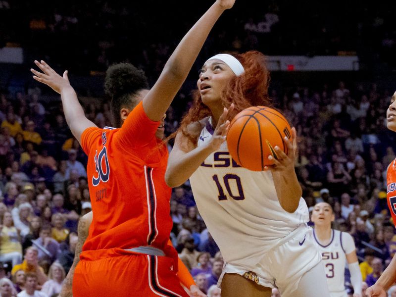 Feb 22, 2024; Baton Rouge, Louisiana, USA;  LSU Lady Tigers forward Angel Reese (10) shoots against Auburn Tigers center Savannah Scott (30) during the first half at Pete Maravich Assembly Center. Mandatory Credit: Matthew Hinton-USA TODAY Sports