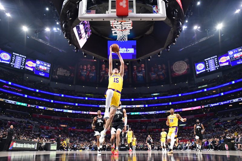 LOS ANGELES, CA - FEBRUARY 28:  Austin Reaves #15 of the Los Angeles Lakers goes to the basket during the game on February 28, 2024 at Crypto.Com Arena in Los Angeles, California. NOTE TO USER: User expressly acknowledges and agrees that, by downloading and/or using this Photograph, user is consenting to the terms and conditions of the Getty Images License Agreement. Mandatory Copyright Notice: Copyright 2024 NBAE (Photo by Adam Pantozzi/NBAE via Getty Images)