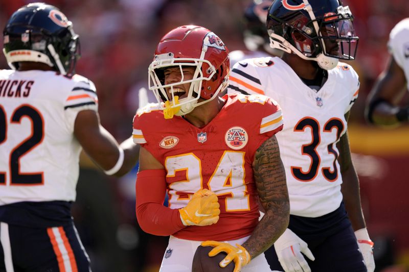 Kansas City Chiefs wide receiver Skyy Moore celebrates after catching a pass for a first down during the first half of an NFL football game against the Chicago Bears Sunday, Sept. 24, 2023, in Kansas City, Mo. (AP Photo/Charlie Riedel)