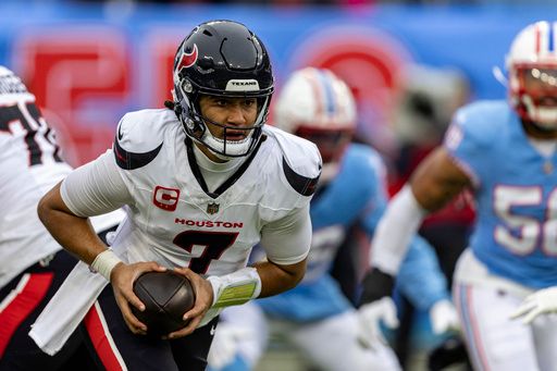 Houston Texans quarterback C.J. Stroud (7) turns to hand the ball off during their NFL football game against the Tennessee Titans, Sunday, Jan. 5, 2025, in Nashville, Tenn. (AP Photo/Wade Payne)