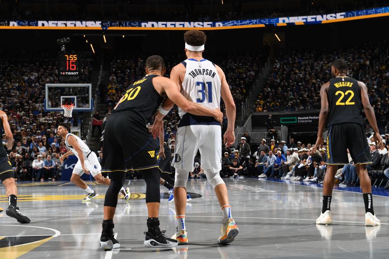 SAN FRANCISCO, CA - NOVEMBER 12: Stephen Curry #30 of the Golden State Warriors defends Klay Thompson #31 of the Dallas Mavericks during the game during the Emirates NBA Cup game on November 12, 2024 at Chase Center in San Francisco, California. NOTE TO USER: User expressly acknowledges and agrees that, by downloading and or using this photograph, user is consenting to the terms and conditions of Getty Images License Agreement. Mandatory Copyright Notice: Copyright 2024 NBAE (Photo by Noah Graham/NBAE via Getty Images)