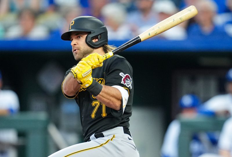 Aug 30, 2023; Kansas City, Missouri, USA; Pittsburgh Pirates third baseman Vinny Capra (71) hits an RBI double during the second inning against the Kansas City Royals at Kauffman Stadium. Mandatory Credit: Jay Biggerstaff-USA TODAY Sports