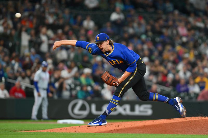 Sep 14, 2024; Seattle, Washington, USA; Seattle Mariners starting pitcher Logan Gilbert (36) pitches to the Texas Rangers during the first inning at T-Mobile Park. Mandatory Credit: Steven Bisig-Imagn Images