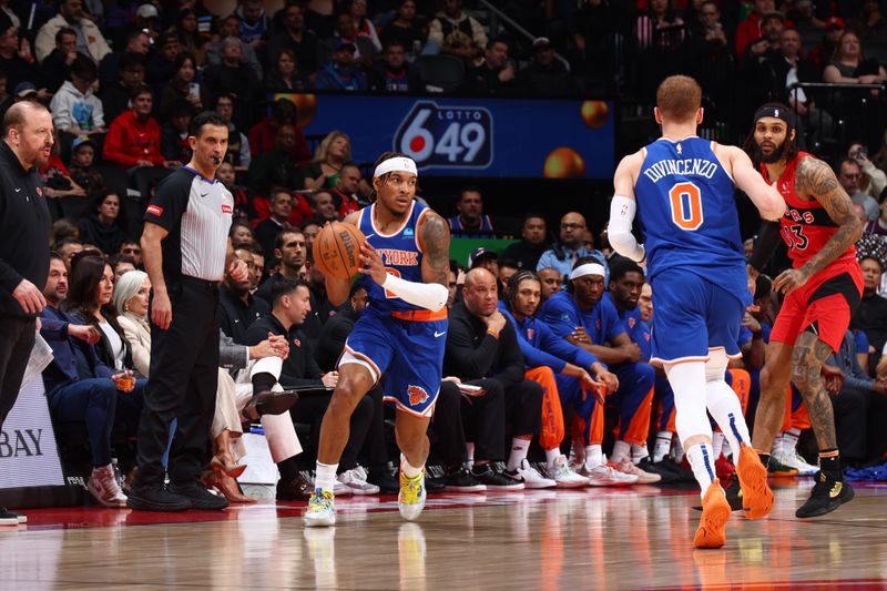 TORONTO, CANADA - MARCH 27: Miles McBride #2 of the New York Knicks dribbles the ball during the game against the Toronto Raptors on March 27, 2024 at the Scotiabank Arena in Toronto, Ontario, Canada.  NOTE TO USER: User expressly acknowledges and agrees that, by downloading and or using this Photograph, user is consenting to the terms and conditions of the Getty Images License Agreement.  Mandatory Copyright Notice: Copyright 2024 NBAE (Photo by Vaughn Ridley/NBAE via Getty Images)