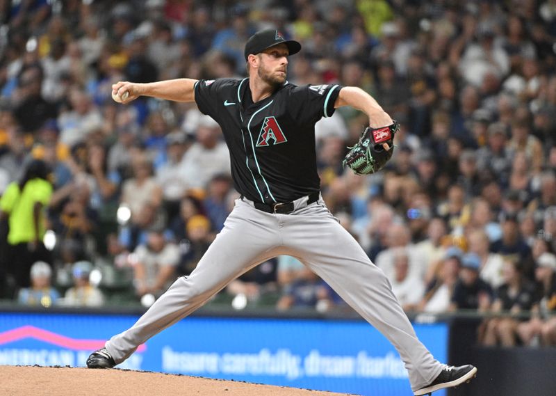 Sep 21, 2024; Milwaukee, Wisconsin, USA; Arizona Diamondbacks pitcher Merrill Kelly (29) delivers a pitch against the Milwaukee Brewers in the first inning at American Family Field. Mandatory Credit: Michael McLoone-Imagn Images