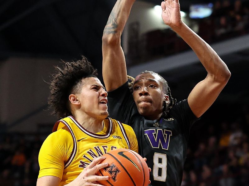 Feb 1, 2025; Minneapolis, Minnesota, USA; Minnesota Golden Gophers guard Mike Mitchell Jr. (2) shoots as Washington Huskies guard Tyler Harris (8) defends during the first half at Williams Arena. Mandatory Credit: Matt Krohn-Imagn Images