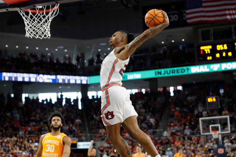 Mar 4, 2023; Auburn, Alabama, USA;  Auburn Tigers guard Allen Flanigan (22) moves for a dunk after being fouled by the Tennessee Volunteers during the second half at Neville Arena. Mandatory Credit: John Reed-USA TODAY Sports