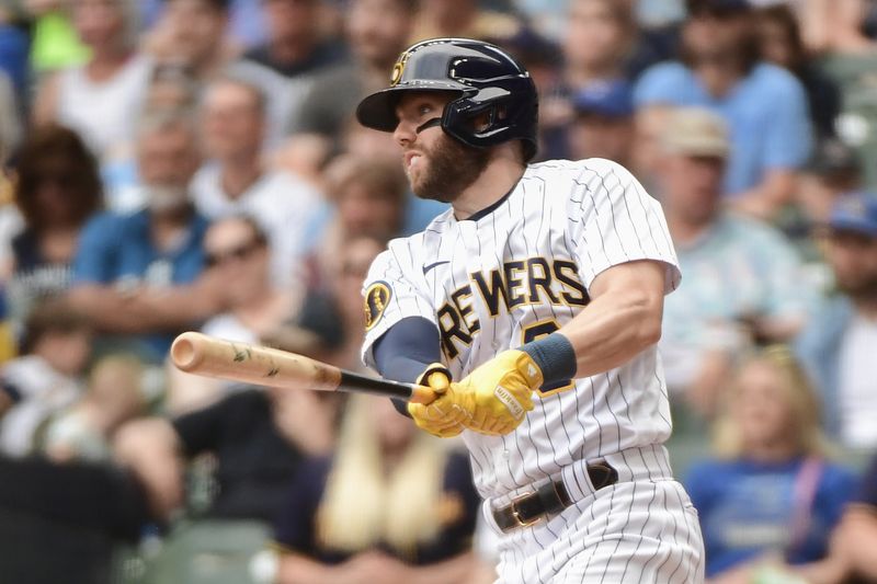 Jun 10, 2023; Milwaukee, Wisconsin, USA; Milwaukee Brewers third baseman Owen Miller (6) hits a single against the Oakland Athletics in the first inning  at American Family Field. Mandatory Credit: Benny Sieu-USA TODAY Sports