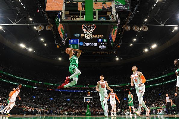 BOSTON, MA - DECEMBER 8: Derrick White #9 of the Boston Celtics goes to the basket during the game on December 8, 2023 at the TD Garden in Boston, Massachusetts. NOTE TO USER: User expressly acknowledges and agrees that, by downloading and or using this photograph, User is consenting to the terms and conditions of the Getty Images License Agreement. Mandatory Copyright Notice: Copyright 2023 NBAE  (Photo by Brian Babineau/NBAE via Getty Images)